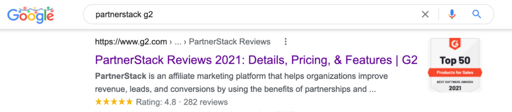 review rating badge image in google organic search result partnerstack g2 example